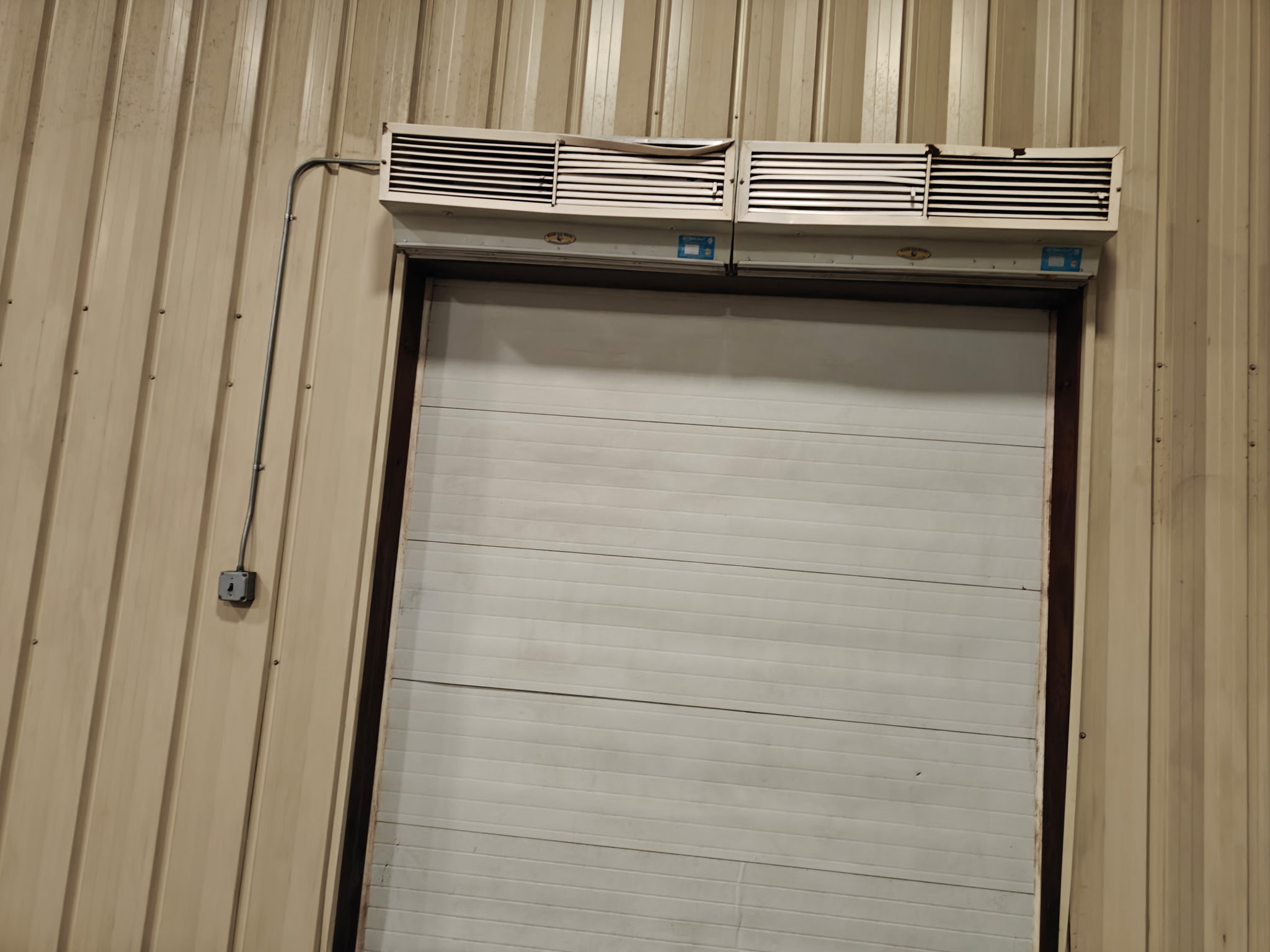 Garage door after ShineWork cleaning — spotless and bright